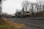 NS 1815 takes train 20E past 20R, which holds on the siding 